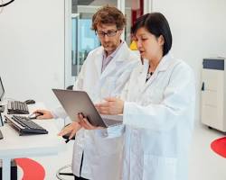 Hình ảnh về pharmacist working in a modern pharmacy or lab