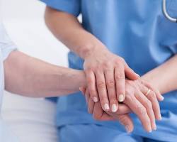 Hình ảnh về Nurses caring for a patient