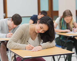 Hình ảnh về Exam hall with students taking a test