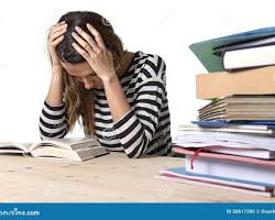 Hình ảnh về Stressed student studying
