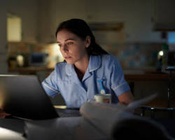 Hình ảnh về Nurse studying at home