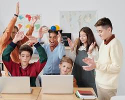 Hình ảnh về Online learning on laptop and Offline classroom setting